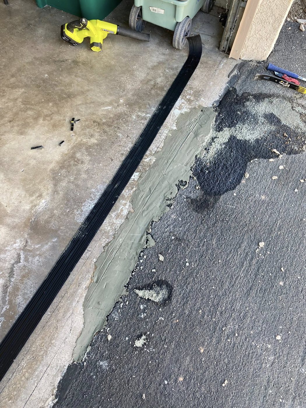 Garage threshold sealed and patched