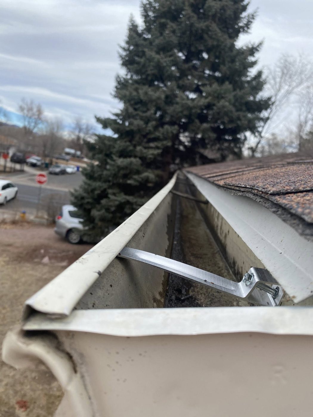 Gutter re-secured with new bracket