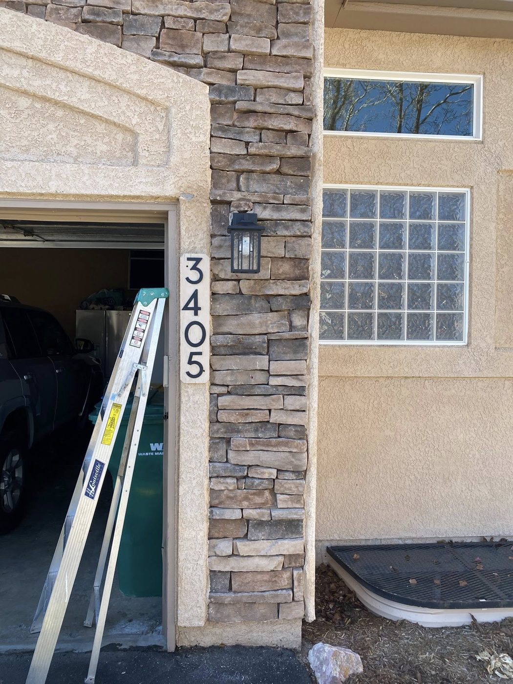 Stone column with address sign
